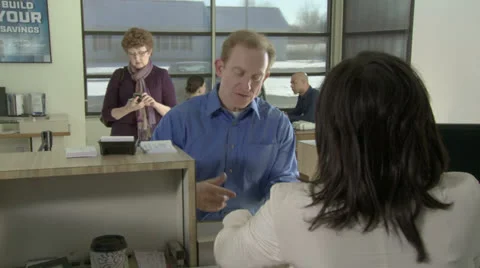 Bank Customer Writes Stock Footage 22858884