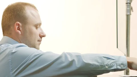 Bank employee checking documents and passport and stamping for approval Stock Footage 94090732