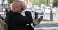 Bank Employee Sidewalk Bench Browse Internet Check Mailbox Bad Financial News 4k or 4k+ Resolution