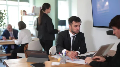 Bank manager talking with male client in office Stock Footage 344849003