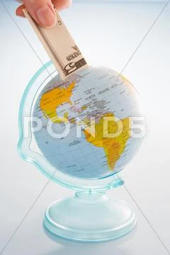 Bank Note And Globe Stock Photos