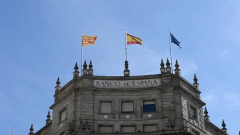 Bank of Spain. Flags spain, catalonia and european. Stock Footage
