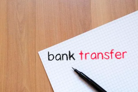 Bank transfer text concept on notebook Stock Photos