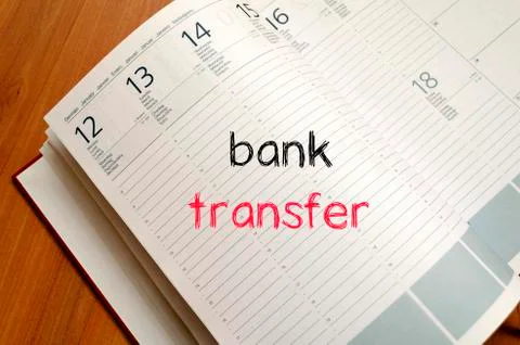 Bank transfer text concept on notebook Stock Photos