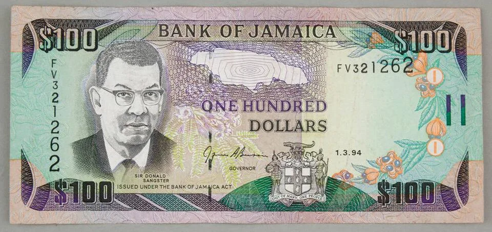 Banknot NA 100 dollars; Jamajka, 1.03.1994 r. Thomas de la Rue & Co LD Lon... Stock Photos