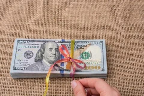 Banknote bundle of US dollar tied with a ribbon 스톡 사진