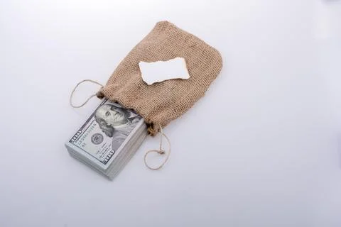 Banknote bundle of US dollarin a sack with a note paper Foto stock