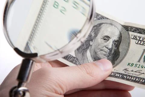 Banknote check for authenticity Stock Photos