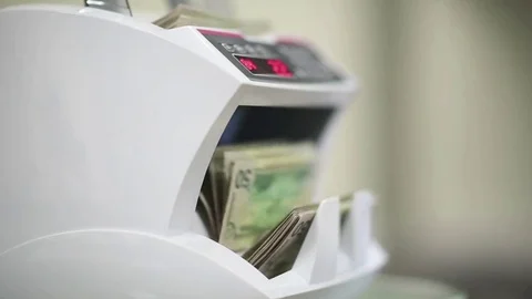 Banknote counter and US dollars Video stock 73272970