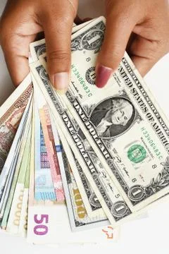 Banknote on hand Stock Photos