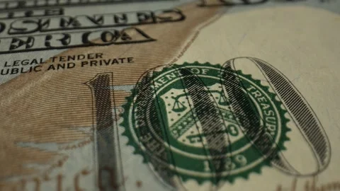 The banknote is located on the dark surface of the table face up. Effective Stock Footage 164145084