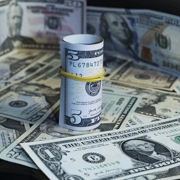 Banknotes of 5 US dollars Stock Photos