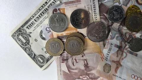Banknotes and Coins of Different Countries Top View. Stock Photos