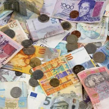 Banknotes and coins Stock Photos
