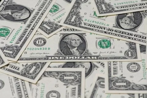 Banknotes background pattern with dollars. Dollars currency texture backgroun Stock Photos
