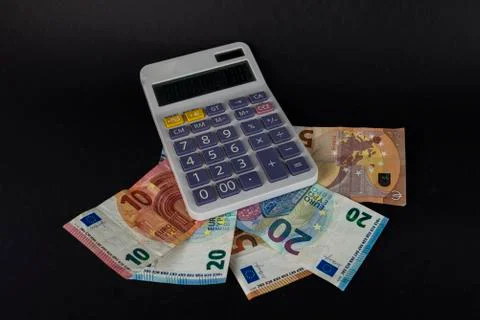 Banknotes with calculator for counting 스톡 사진