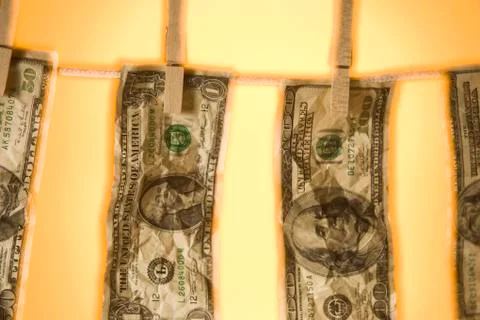 Banknotes on clothesline Stock Photos