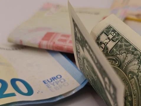 Banknotes of different countries on the table macro photography Stock Photos