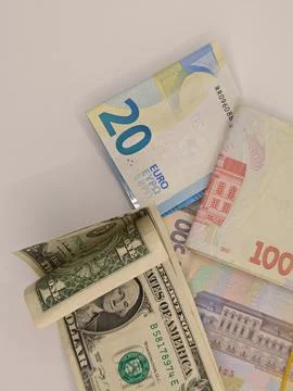 Banknotes of different countries on the table Stock Photos