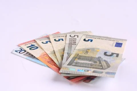 Banknotes of different values on a white background - euro Stock Photos