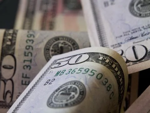 Banknotes with a face value of 50 dollars close-up. American paper money. Stock Photos