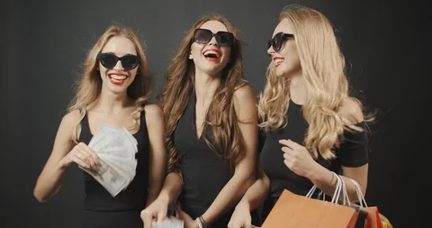 Banknotes Falling on Smiling Ladies 動画素材 119087816