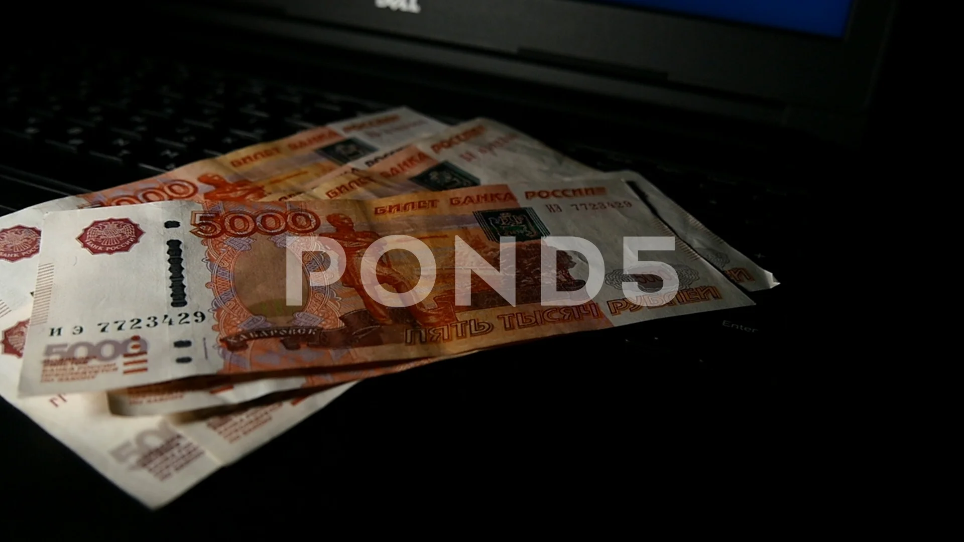 Banknotes Five Thousand Rubles On Keyboard Of Laptop Clip 69919997