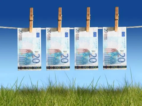 Banknotes hanging on laundry line. 写真素材