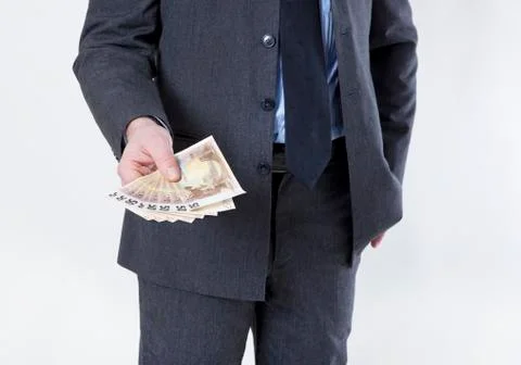 Banknotes in his hand Stock Photos