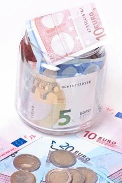 Banknotes in jar Stock Photos