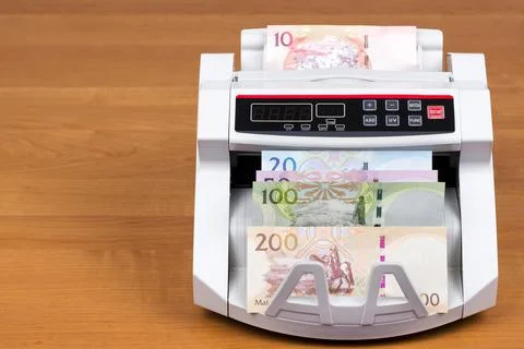 Banknotes of Lesotho in the counting machine Stock Photos