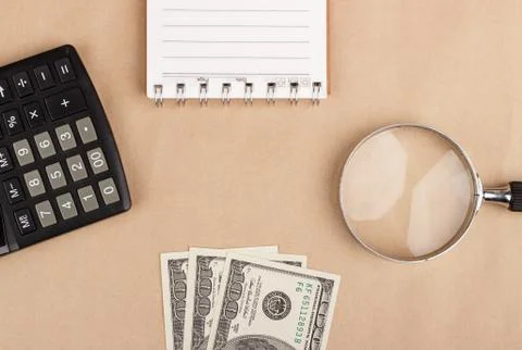 Banknotes, notepad, calculator. Background Stock Photos
