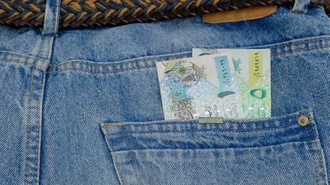 Banknotes in the pocket Stock Photos
