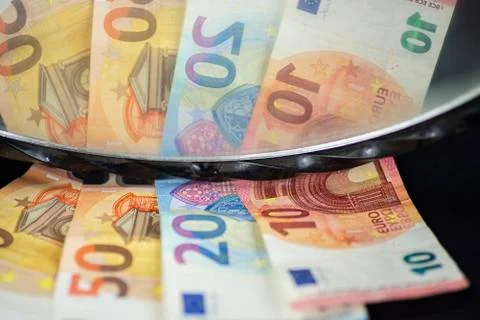 Banknotes reflected in the mirror Stock Photos