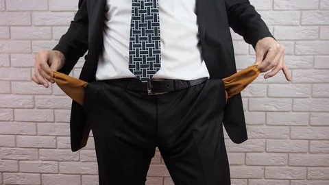 Bankrupt. Businessman showing empty pockets. Stock Footage 85367500
