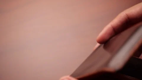 Bankruptcy - Man hand open an empty wallet in slow motion Stockbeeldmateriaal 125724783