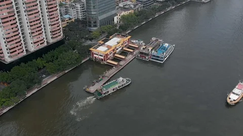 On the banks of the river is a ferry pier. Video stock 118113953