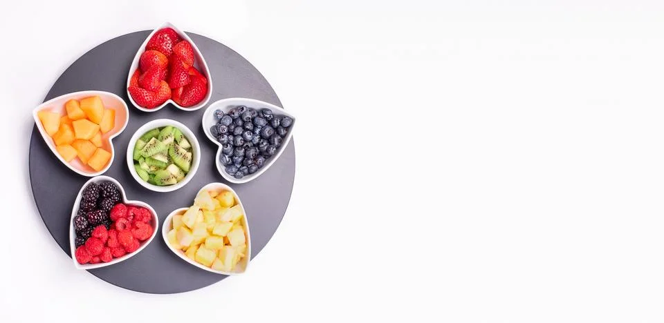 Banner with Assorted fresh berries and fruits on white background, copy space Stock Photos