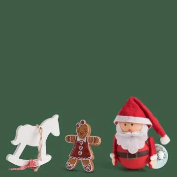 Banner, backdrop or background with a cute Santa Claus Doll, a gingerbread do Stock Photos