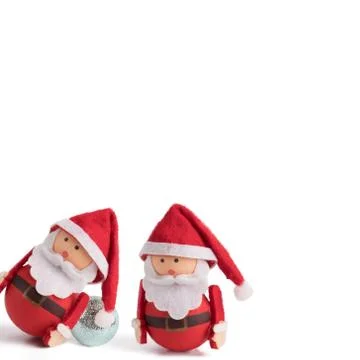 Banner, backdrop or background with two cute Santa Claus Doll on a white back Stock Photos