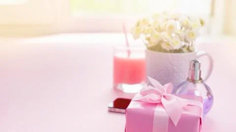 Banner Composition flat lay gift to a woman Modern gadget mobile phone glass  Stock Photos