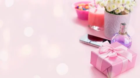 Banner Composition flat lay gift to a woman Modern gadget mobile phone glass  Stock Photos