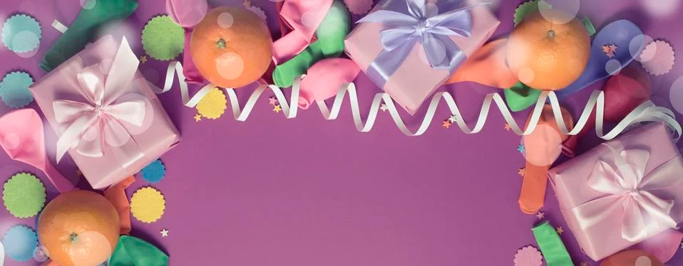 Banner Decorative composition Three boxes with gifts Satin ribbon Bow Oranges Stock Photos