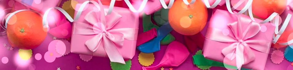 Banner Decorative composition Three boxes with gifts Satin ribbon Bow Oranges Stock Photos