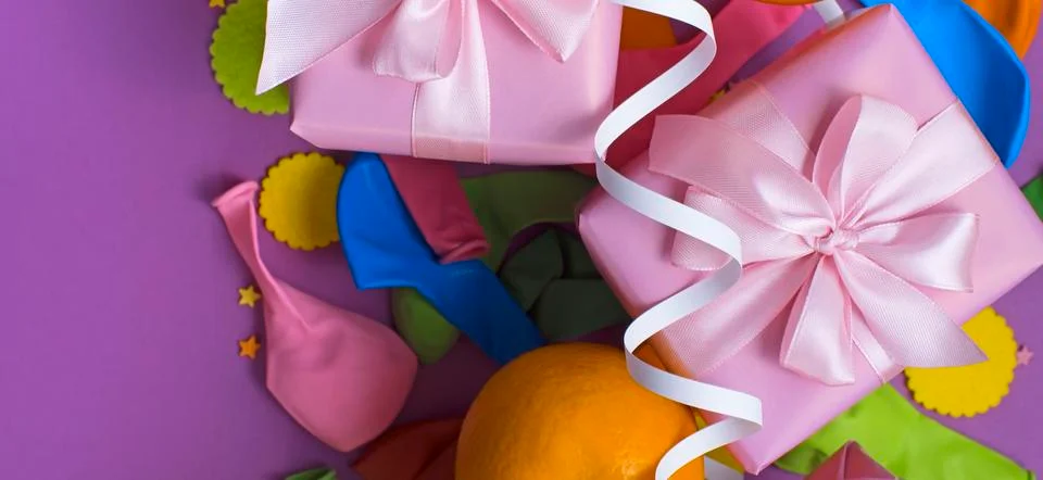 Banner Decorative composition Two boxes with gifts Satin ribbon Bow Oranges C Stock Photos