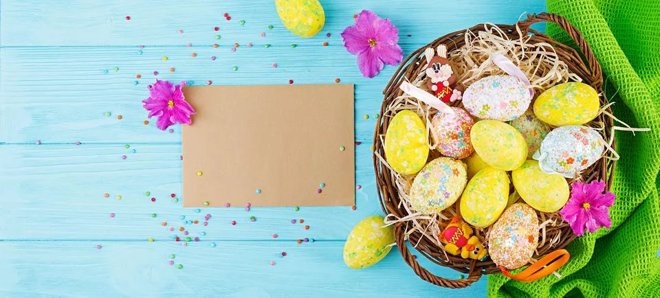 Banner with easter background. Background with flowers and easter eggs. Top.. Stock Photos