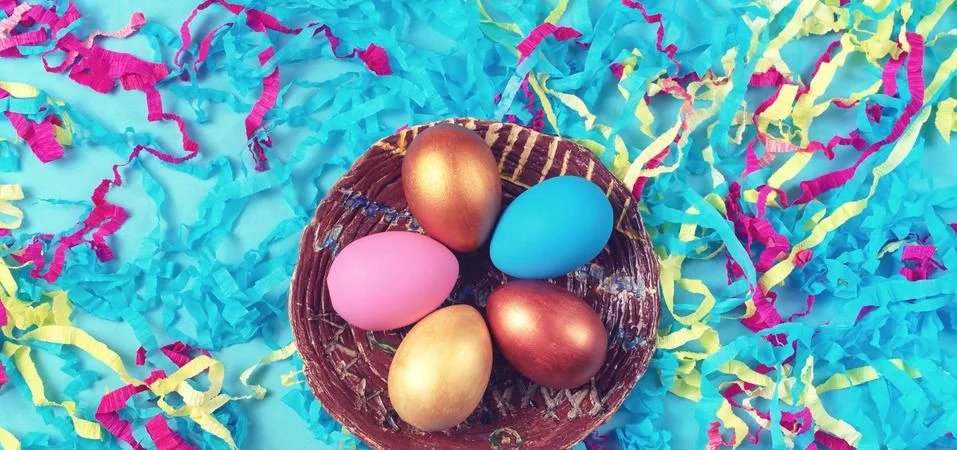 Banner Easter set of colored eggs on bright blue background Easter holiday de Stock Photos