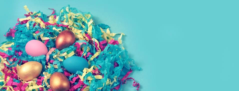 Banner Easter set of colored eggs on bright blue background Easter holiday de Stock Photos