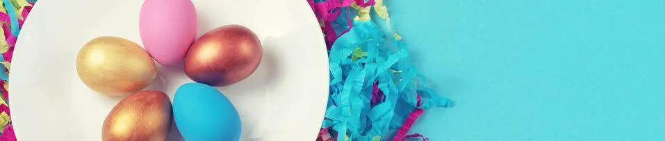 Banner Easter set of colored eggs on bright blue background Easter holiday de Stock Photos