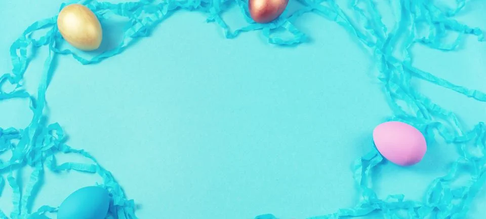 Banner Easter set of colored eggs on bright blue background Easter holiday de Stock Photos